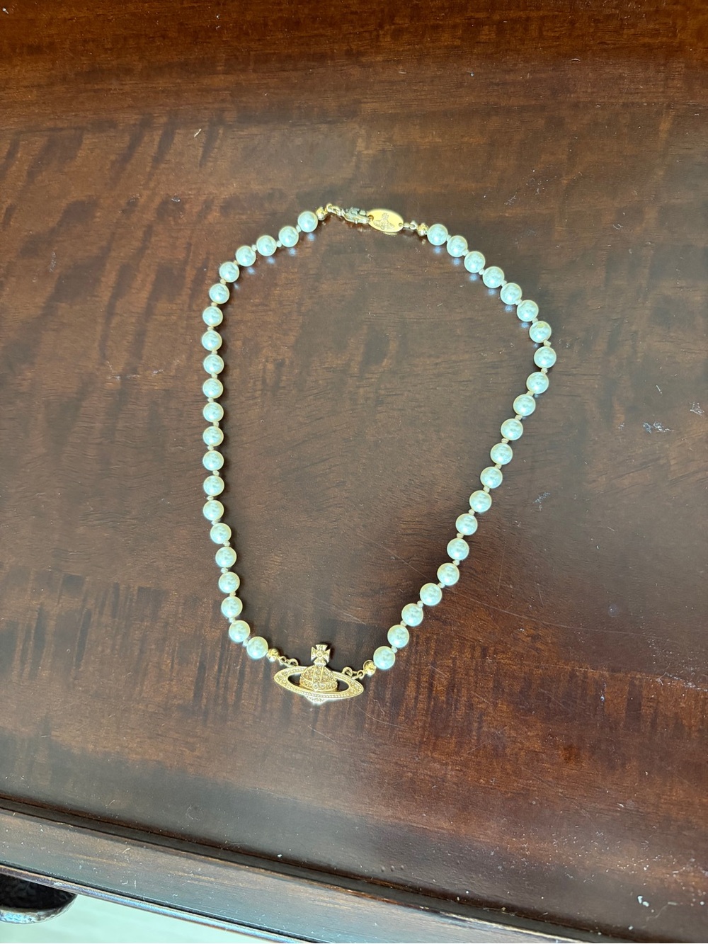 Vivienne Westwood Gold Tone Planet Pendant with White Pearls Necklace